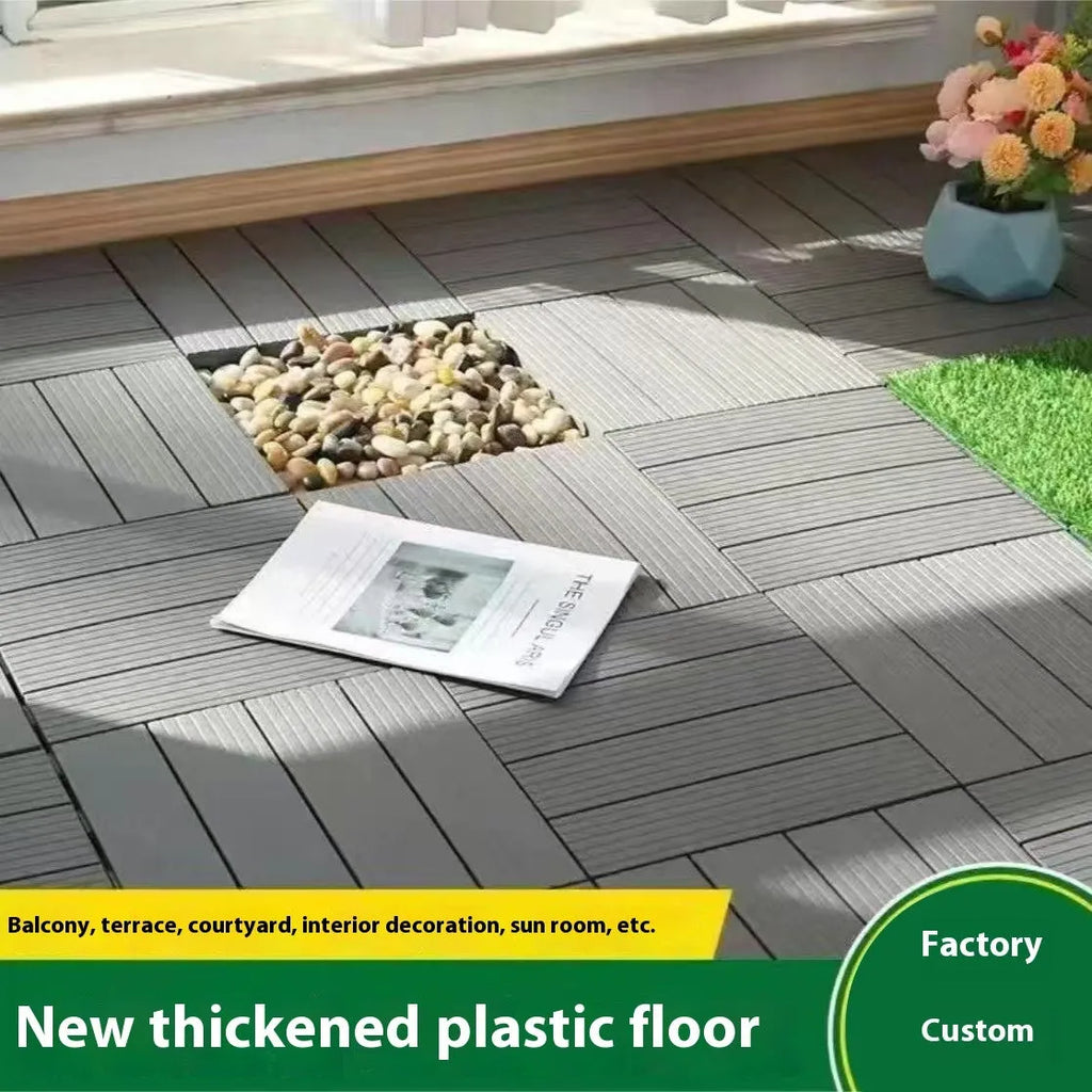 Pack of 10 wood grain style plastic interlocking floor tiles showing non-slip texture