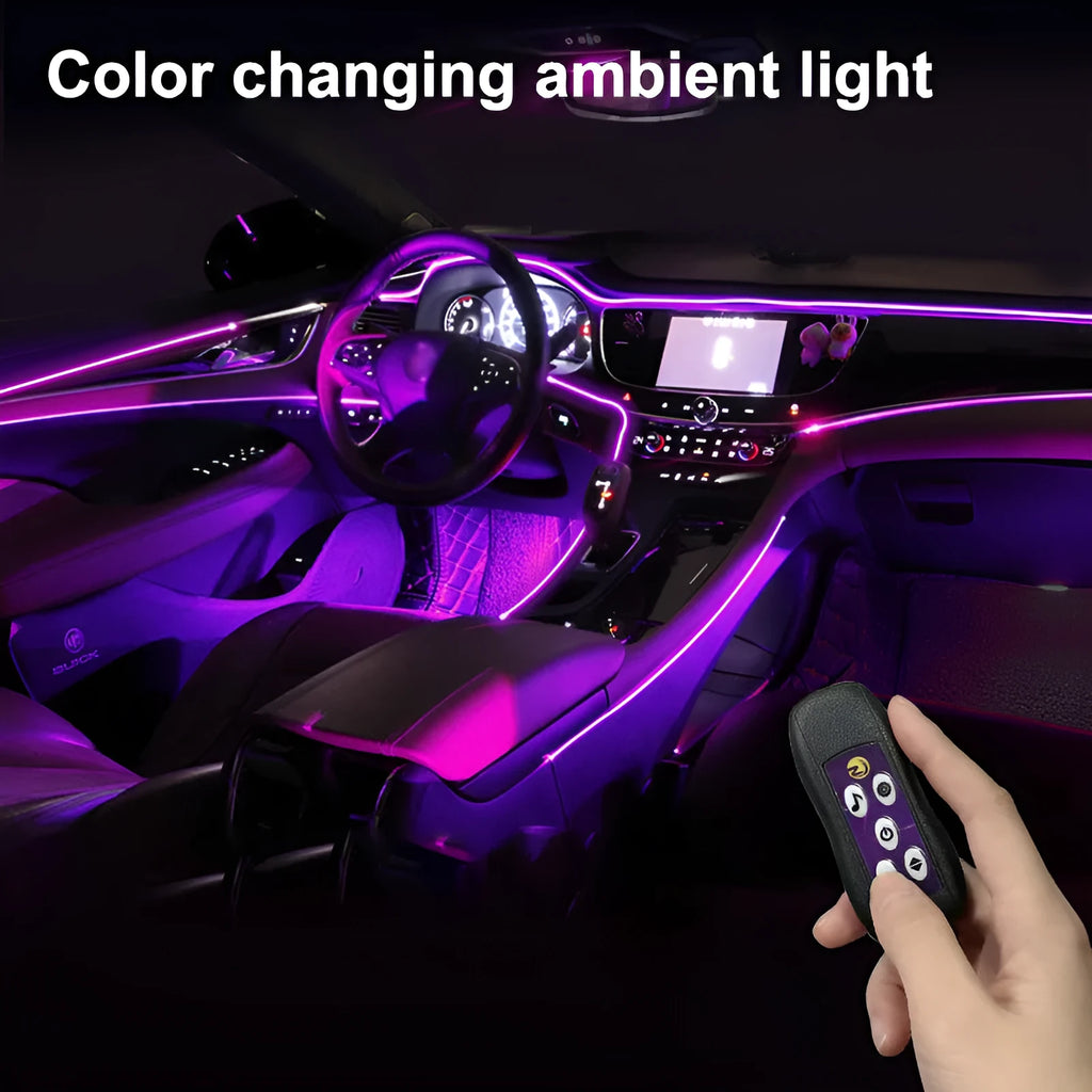Car interior LED atmosphere lighting strip installed along dashboard with colour changing illumination