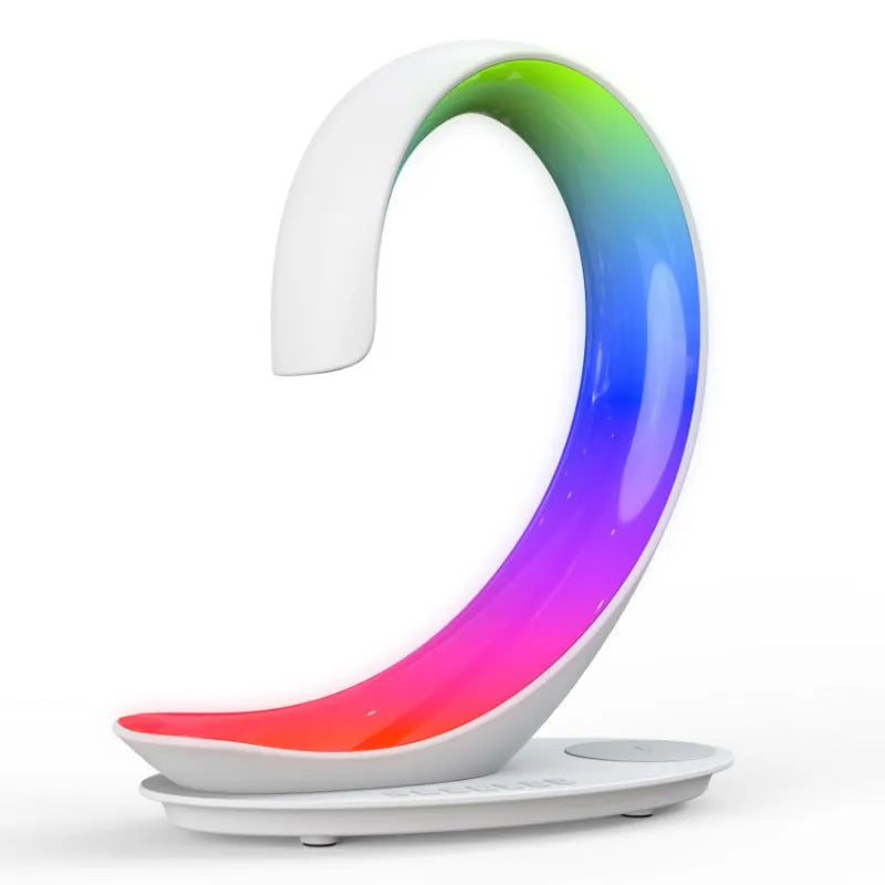 White swan sculpture desktop wireless charger with Bluetooth speaker and colourful LED atmosphere lighting