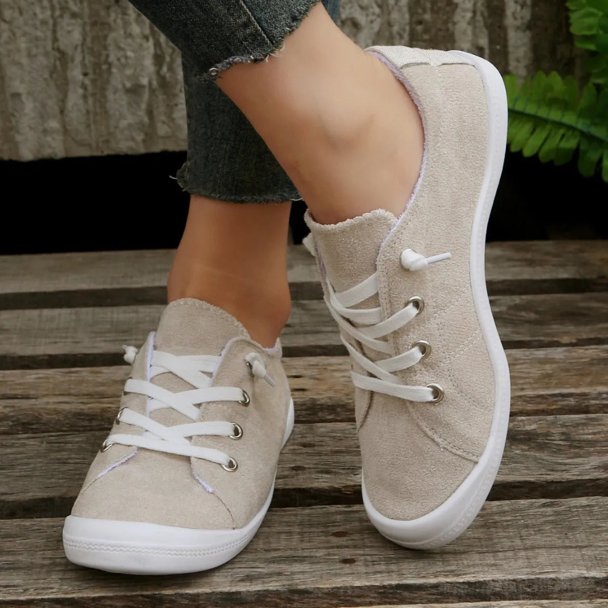 Women's creamy white casual sneakers with fabric upper and rubber sole
