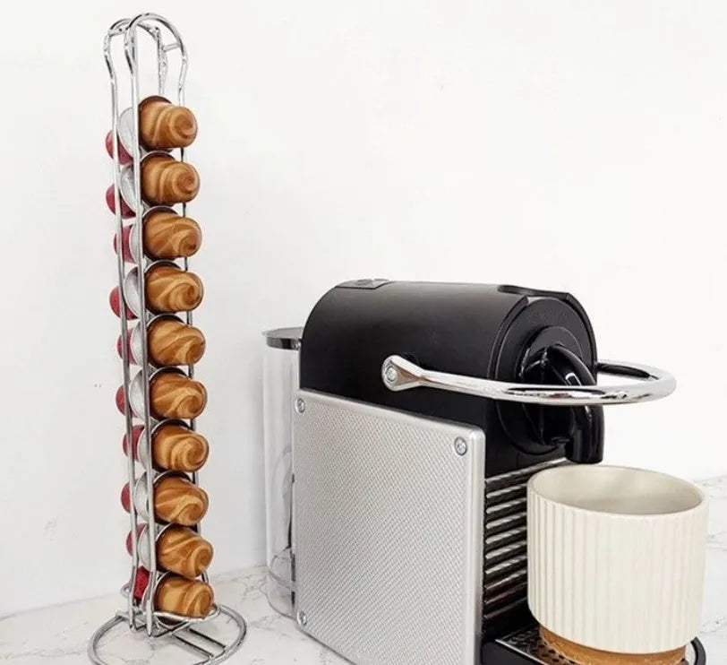 Wrought iron coffee capsule storage rack holding pods on display shelves