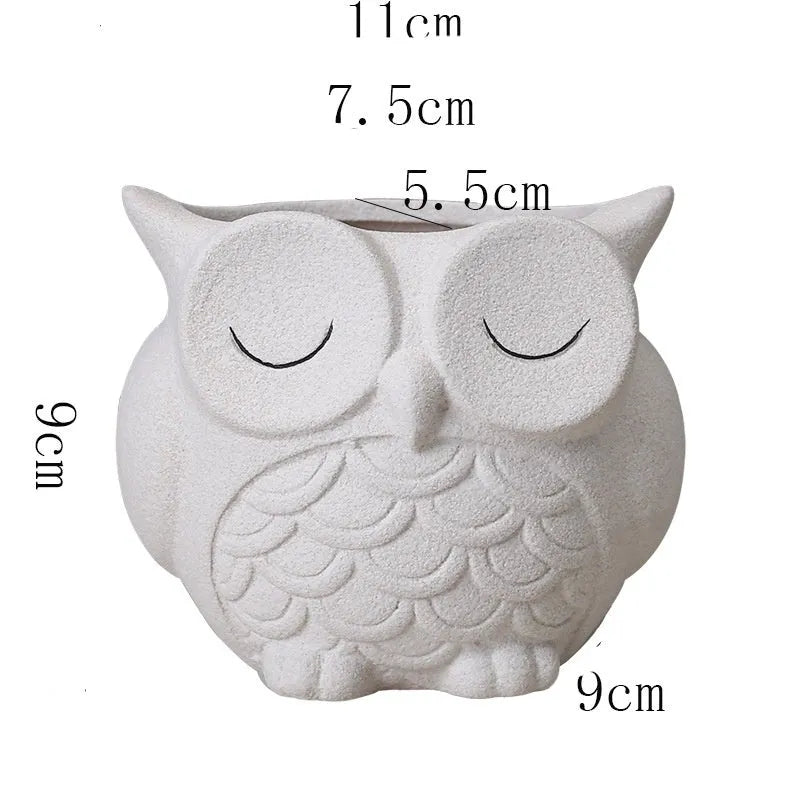 Handmade frosted ceramic flower pot with a cartoon owl design for succulents.