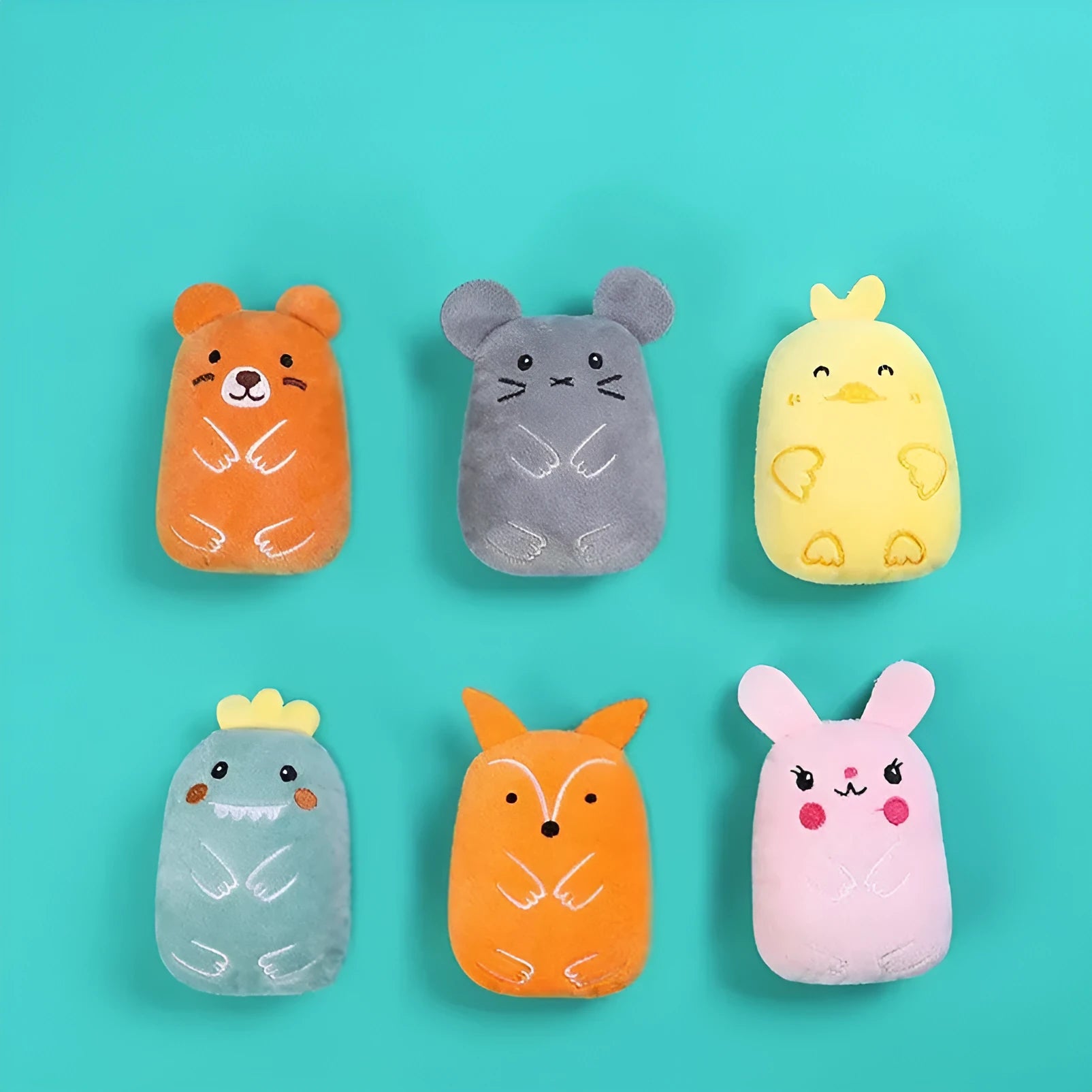 Plush catnip chewing toy for teeth grinding with vocal sounds, shown in assorted colours