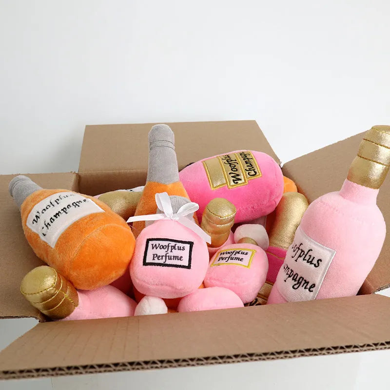 Soft plush pet toy in the shape of a wine bottle, shown in multiple colour options.