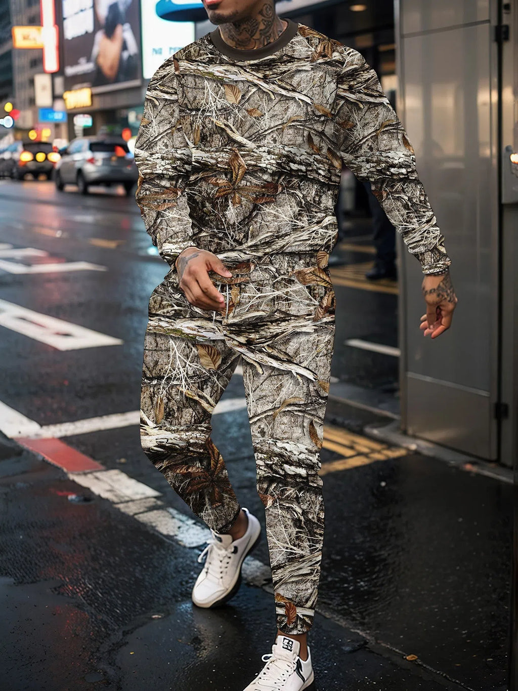 Two-piece jungle camouflage sportswear set with long-sleeve round neck top and matching trousers on a male model