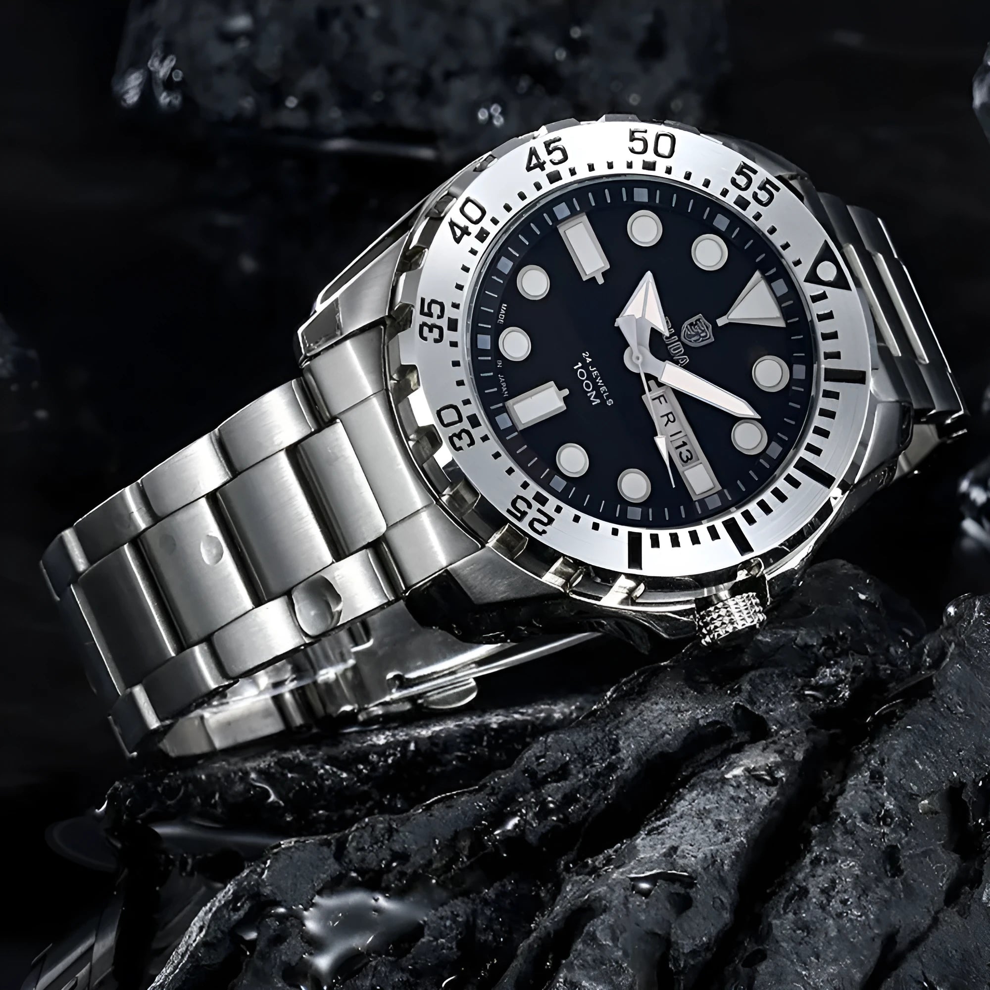 Men's silver waterproof quartz watch with luminous blue dial and steel bracelet on wrist