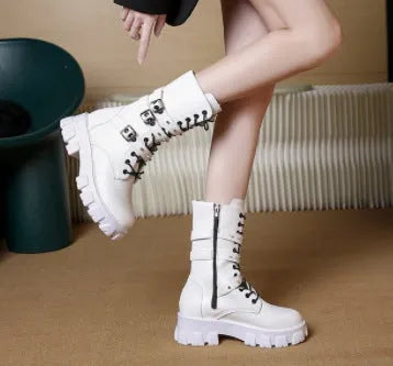 Women's black mid-calf knight boots with side zip and metal buckle details on artificial PU upper
