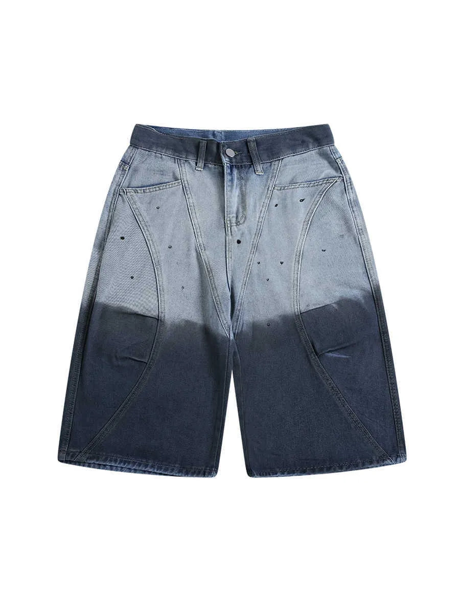 Blue tie-dye gradient washed-out cropped jeans on a model, showing loose fit and mid-waist.