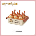 Plastic ice cream mould for making octopus balls shaped frozen desserts.