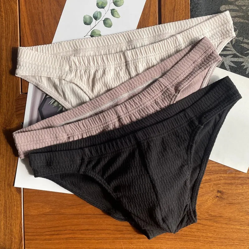 Men's pure cotton triangle underwear briefs in solid skin color black white and apricot mid-waist style