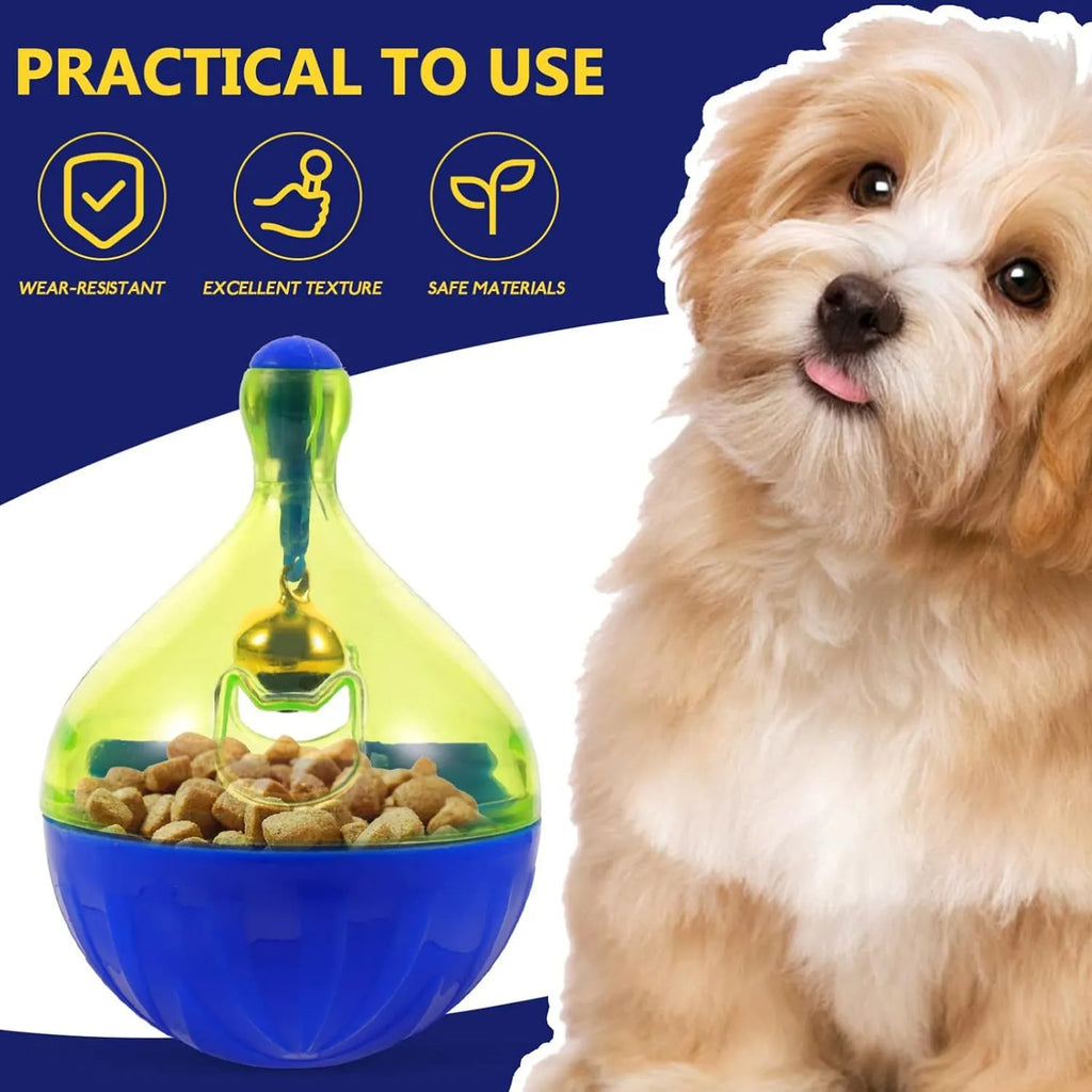 Grey tumbler-shaped interactive pet treat dispenser ball on a wooden floor.