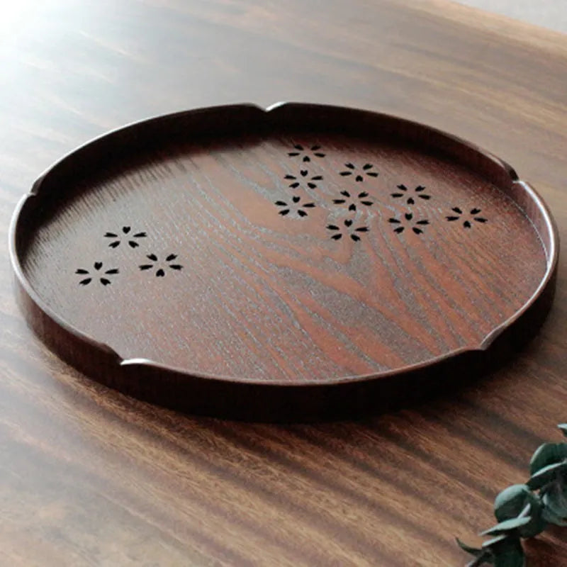 Circular wooden plate with hollow cherry blossom pattern, 30cm diameter, shallow depth.