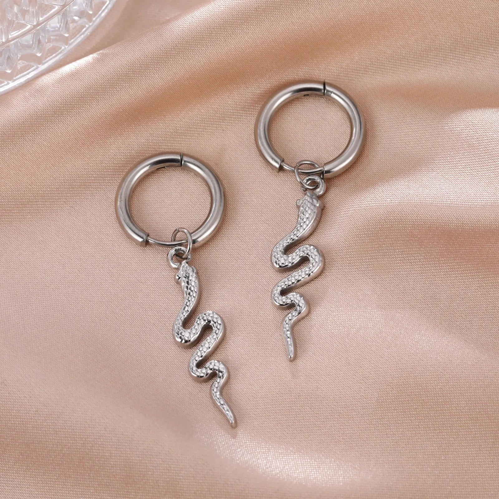 Gold snake clip-on earrings in vintage animal zodiac design