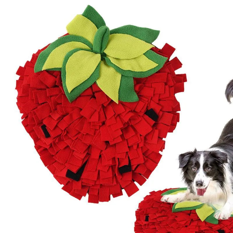 Red and green strawberry-shaped pet slow feeder mat with textured hiding spots