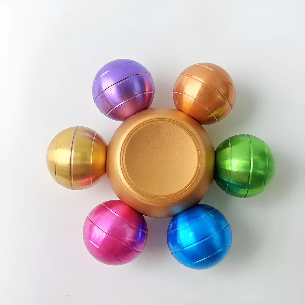 Colourful six Dragon Ball six-bead fingertip gyro in zinc alloy with metal bearing, approximately 6 x 2.2 cm