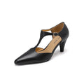 Brown retro women's T-strap closed-toe sandals with a 6-8cm heel on a wooden floor.