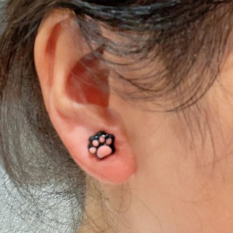 Cat paw magnetic ear clips in transparent pink, black, and white, plastic resin, 1 pair for female students
