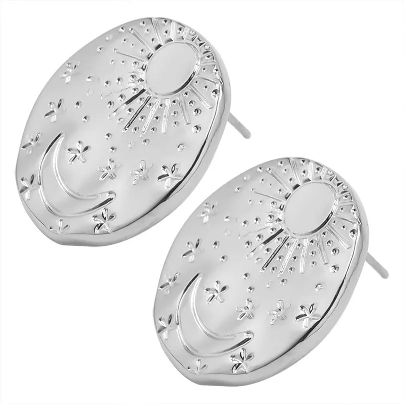 A pair of geometric shell design stud earrings in 304 stainless steel, shown in gold and silver finishes.
