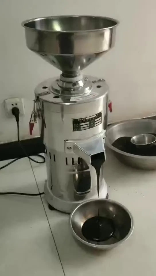 Stainless steel and aluminium electric sesame paste grinding machine for household use.