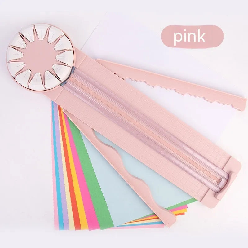 12-in-1 plastic paper cutting machine with dotted board in pink or black, measuring 46.2 cm long