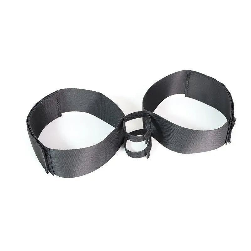 Black knitted adult strap with appliance attachment for discreet home use