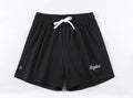 Men's black double-layer mesh sports shorts on a white background.