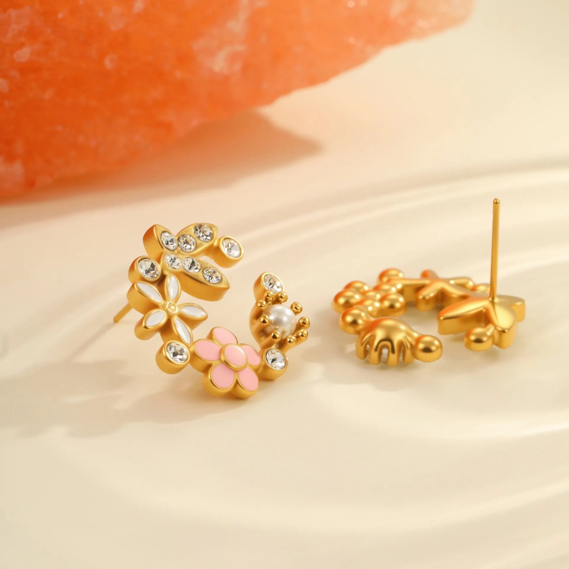Gold-plated flower stud earrings with colourful oil diamond centre and petal design on stainless steel