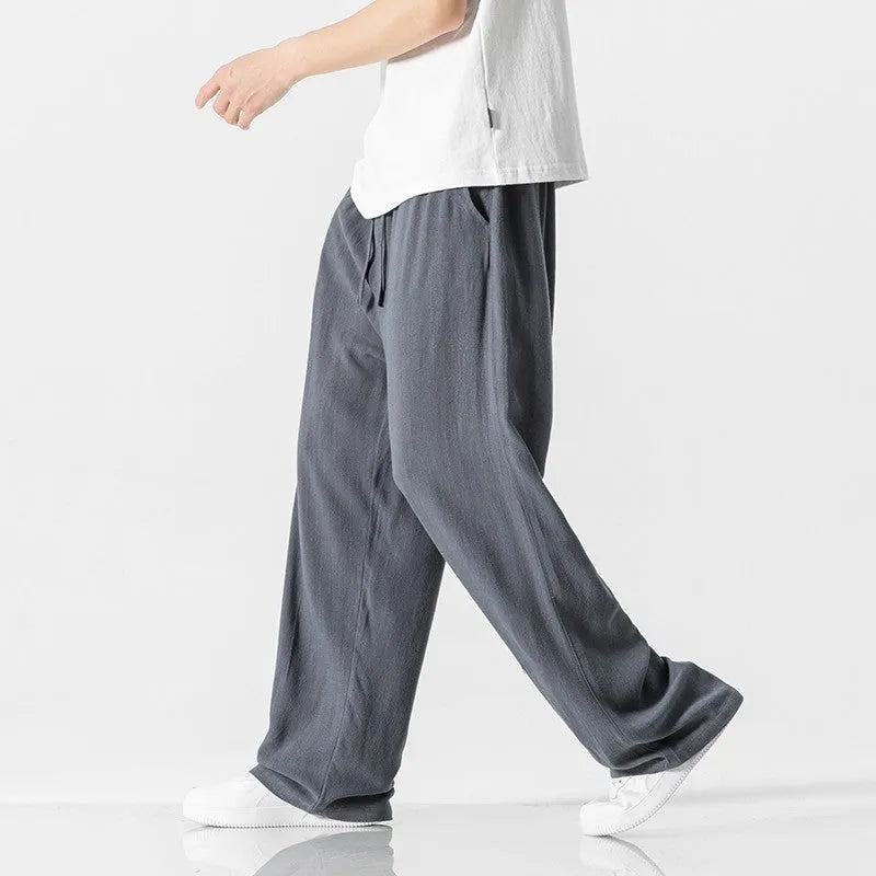 Men's linen trousers in straight-leg cut with cropped length and drawstring waist in beige colour
