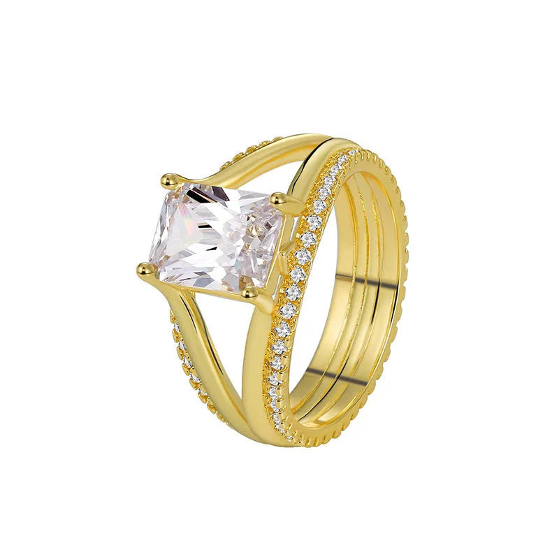 Gold coloured geometric women's ring with square zircon detailing on copper with electroplated finish