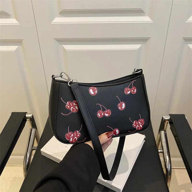 Dumpling-shaped PU underarm bag with floral print, single shoulder strap, three-dimensional outer pocket, in khaki.