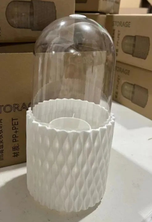 White acrylic rotating makeup brush storage holder with transparent lid and split compartments