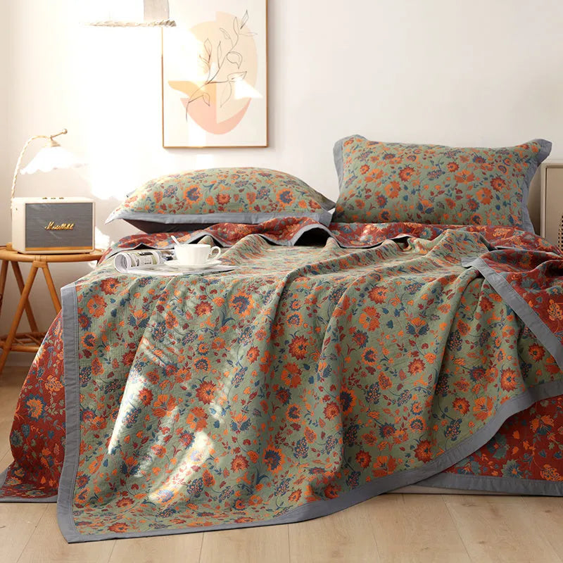 Cotton gauze bed blanket three-piece set with floral patterns showing blanket and two pillowcases