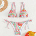 Women's lace-up front split swimsuit with backless briefs style in polyester fabric