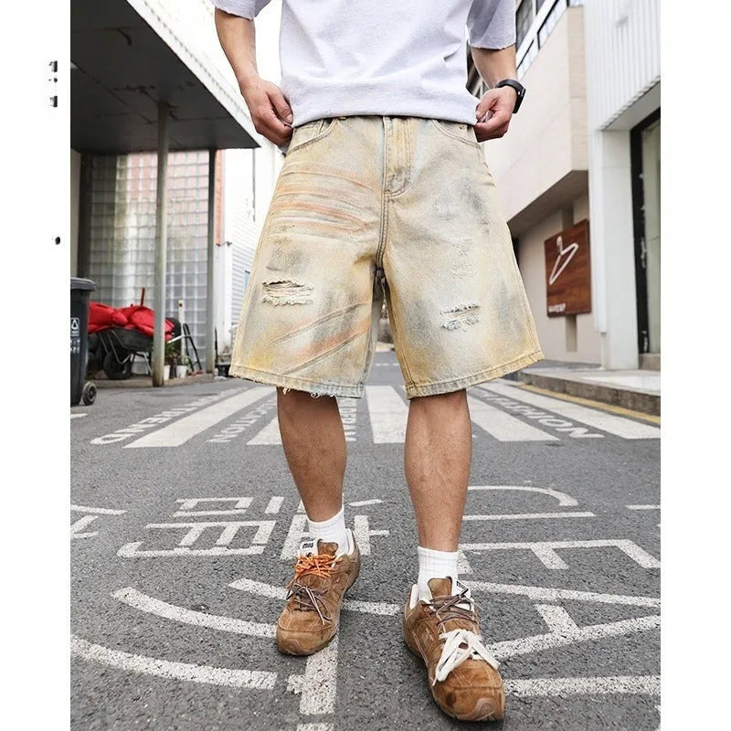 Light blue distressed denim shorts for men with straight-leg cut and mid-waist fit