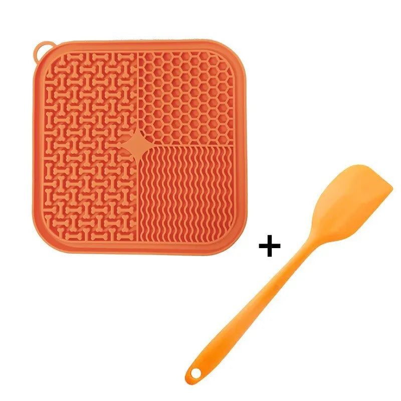 Square silicone dog licking mat with textured surface and suction cups on reverse side