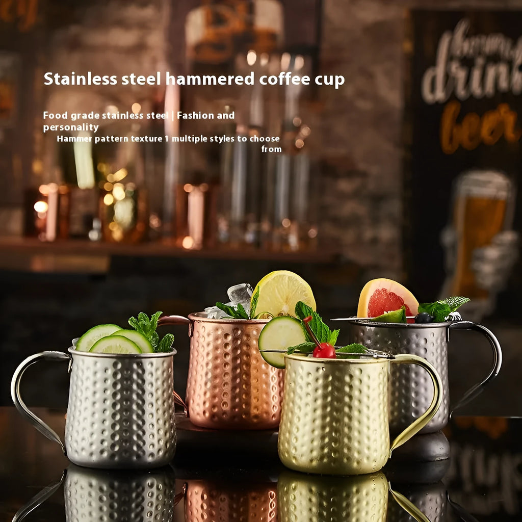 Stainless steel Moscow Mule cup with glass liner in rose gold hammered finish.