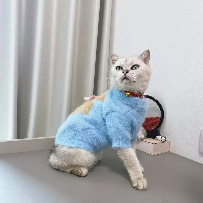 Wool pet sweater with bow tie and bear design in purple, pink, green-blue, or white, sizes XS to XXL.