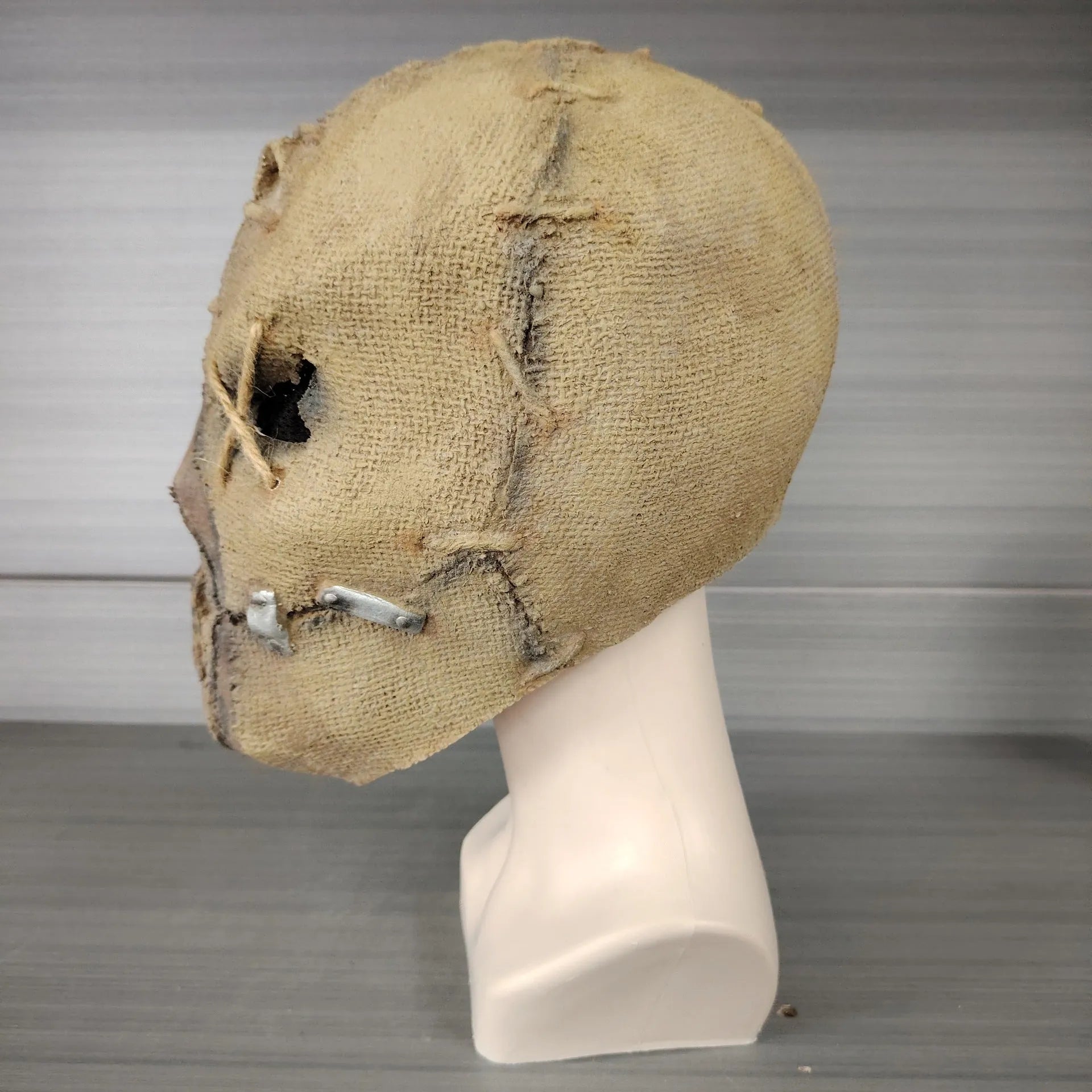 Latex horror mask with scar skull design covering full head, dimensions 31cm by 25cm