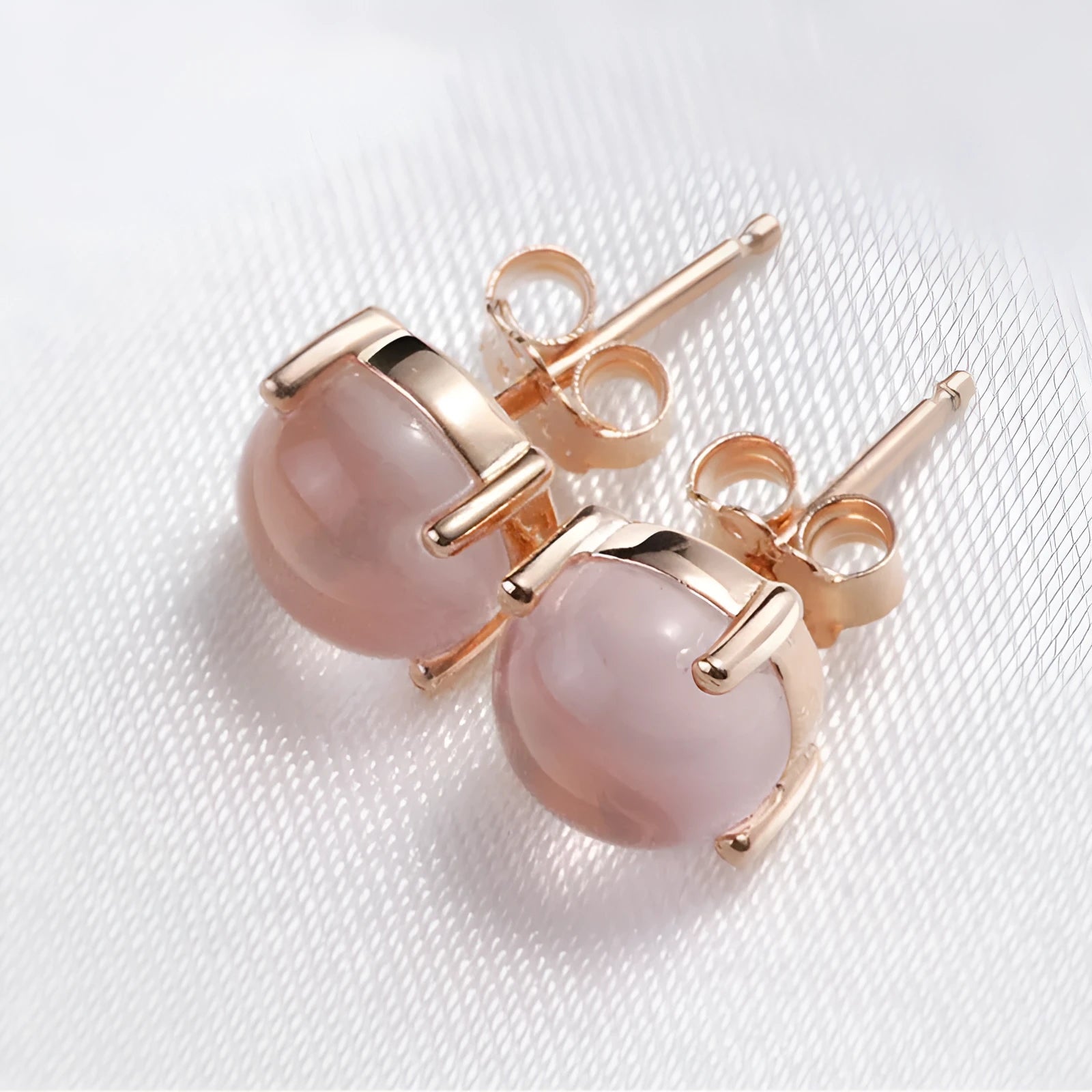 Women's rose gold drop-shaped stud earrings with crystal inlay and Korean style design