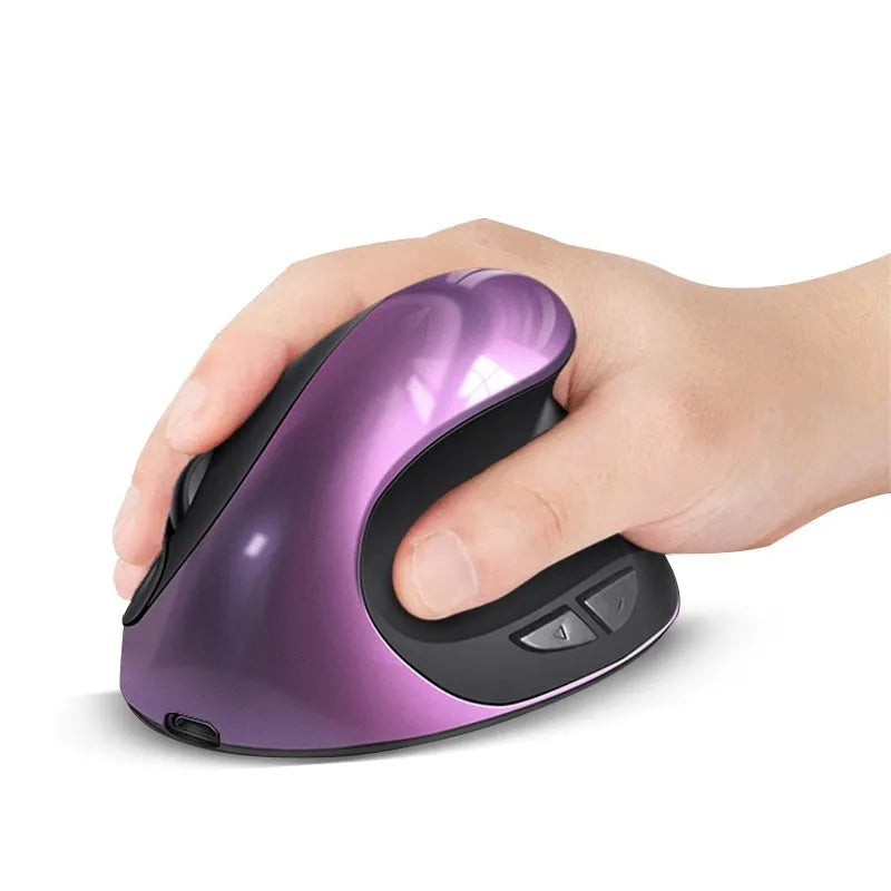 Three Generations wireless vertical ergonomic mouse in black, shown on a desk next to a laptop.