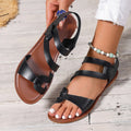 Women's flat sandals with Velcro strap in PU leather with round toe and rubber sole