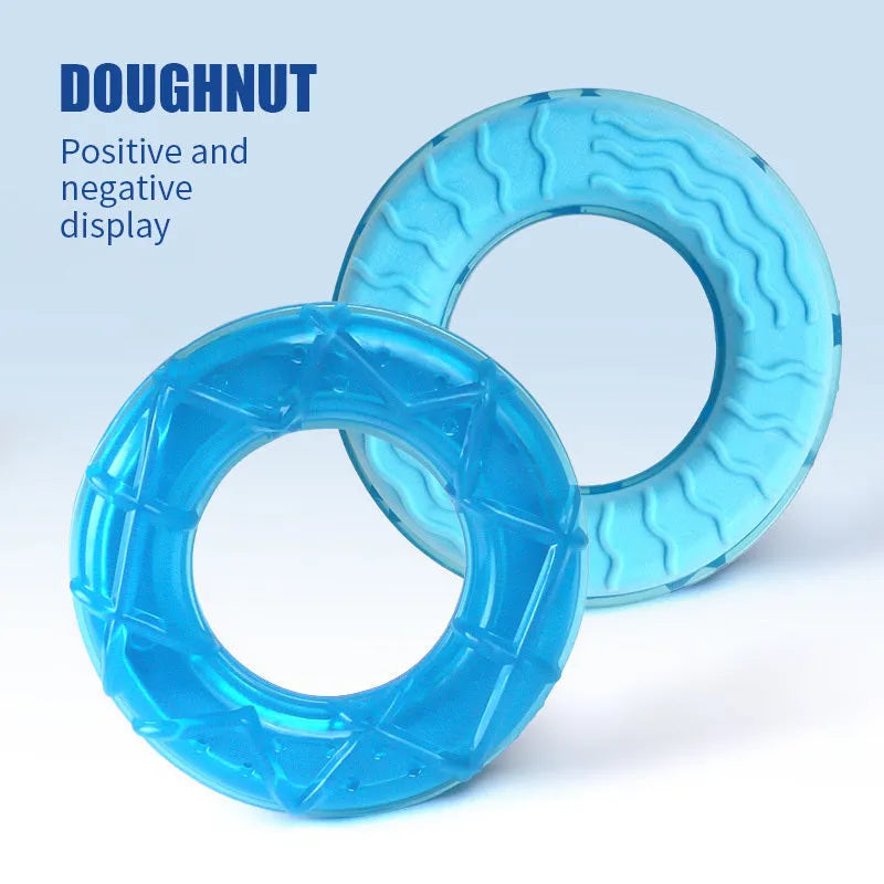 Set of three BPA-free silicone dog toys: a blue pacifier, a red popsicle, and a green ring, designed to be filled with water and frozen.