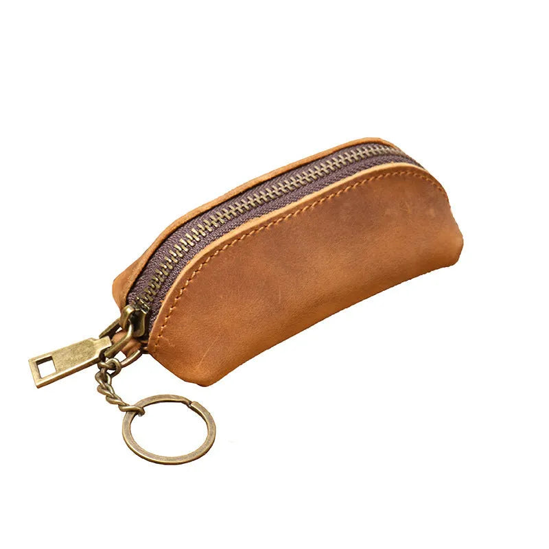 Men's leather clutch coin purse in first layer cowhide with chain, shown in brown yellow, dark brown or black