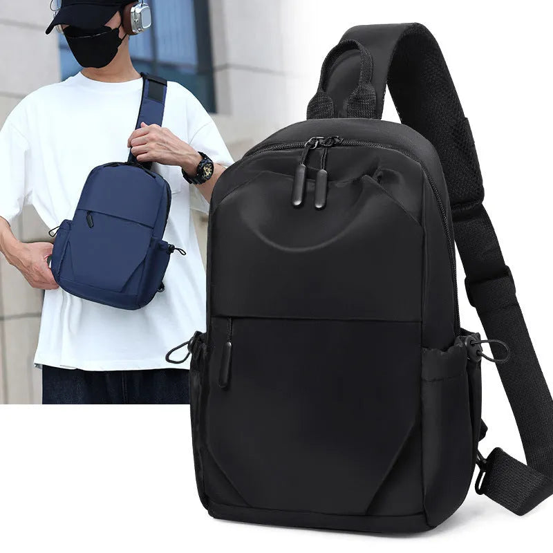 Men's grey waterproof polyester chest bag showing 33cm height dimension