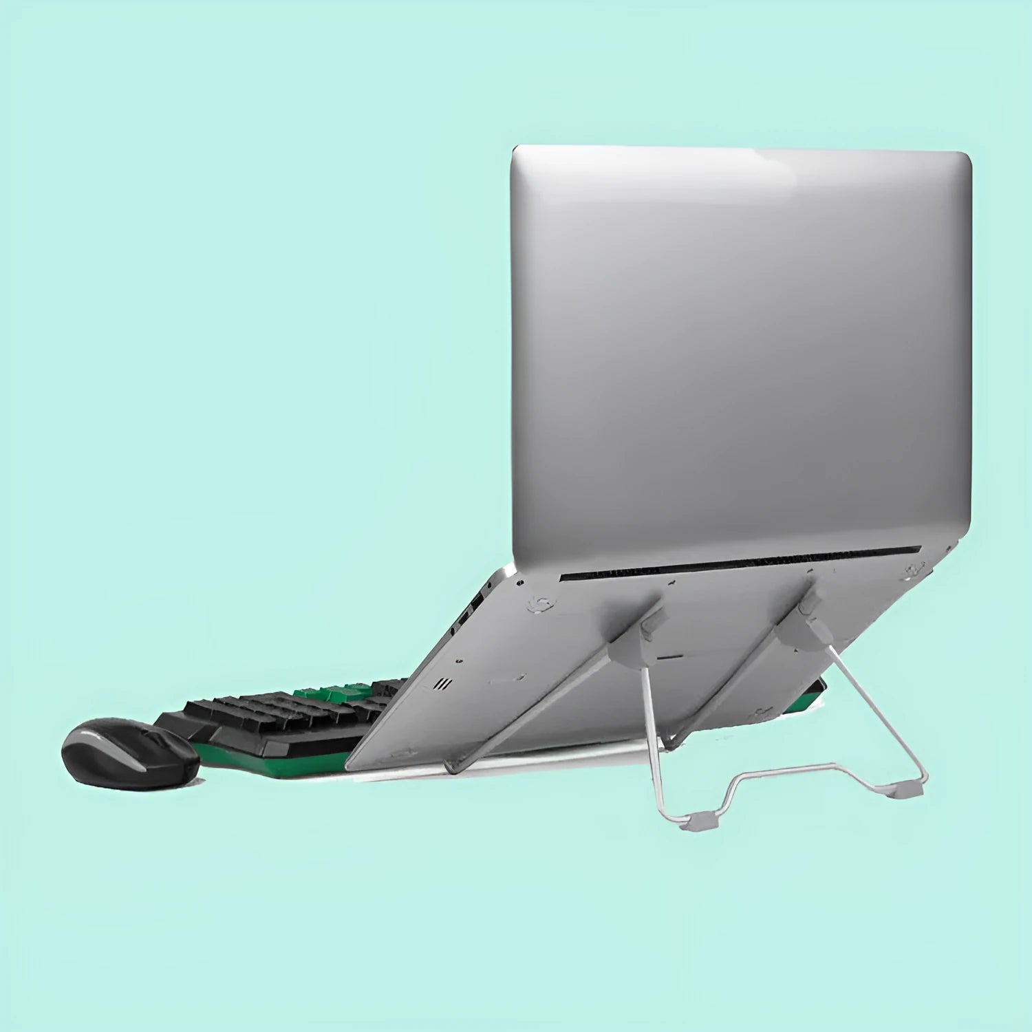Grey aluminium alloy mobile phone and laptop stand on a wooden desk.