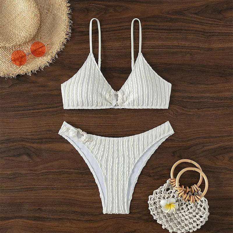 White women's V-neck beach split swimsuit with sleeveless design for swimming