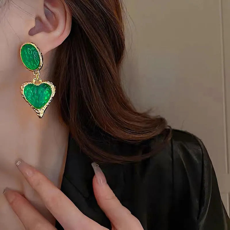 Silver pleated heart-shaped alloy stud earrings in multiple colour options