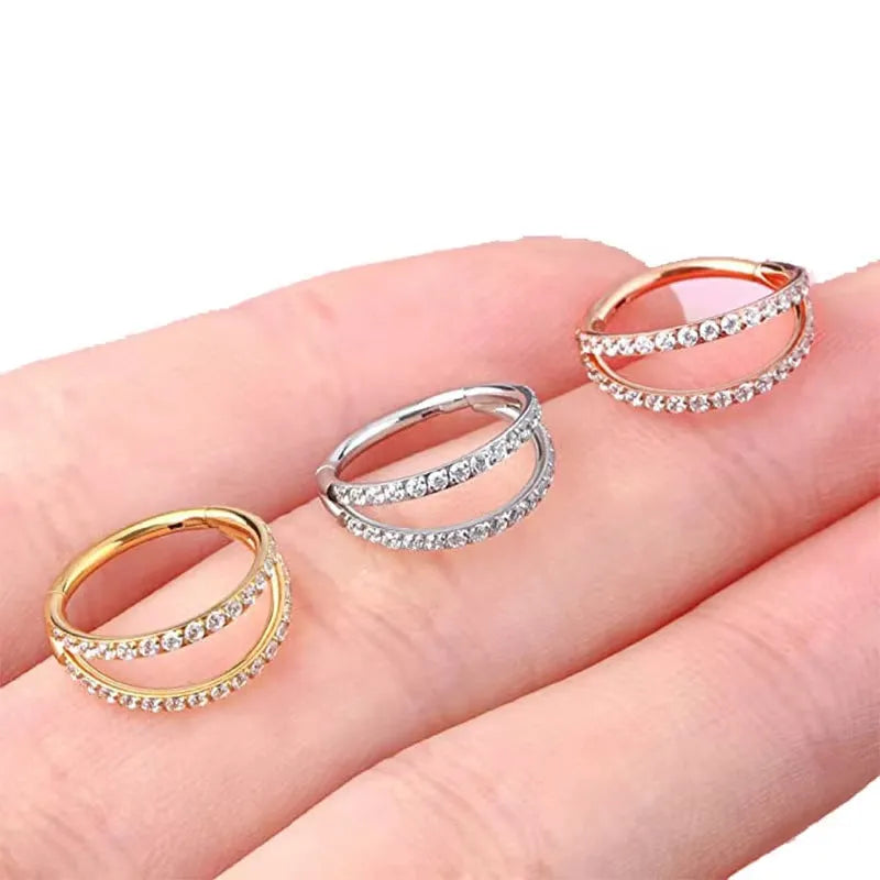 Titanium alloy nose ring with G23 monoclinic diamond treatment in steel or gold colour options