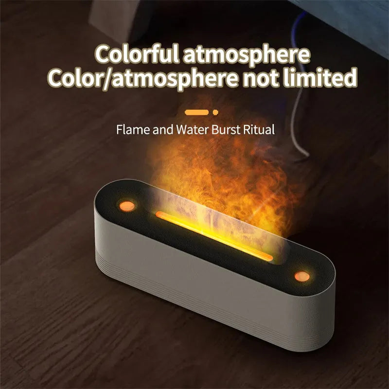 Tall black ultrasonic aroma diffuser with coloured flame LED light and rising water mist on a desk.
