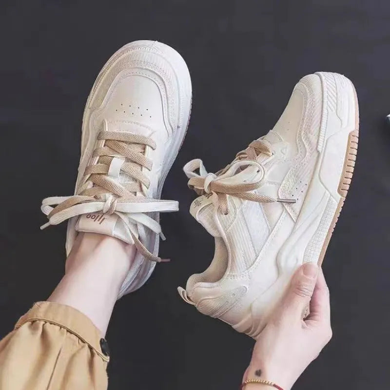 Beige low-top rubber sneakers with height increasing soles and imitation leather lining